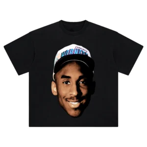 Kobe Bryant Big Face Graphic Tee featuring Kobe Bryant wearing a Charlotte Hornets hat